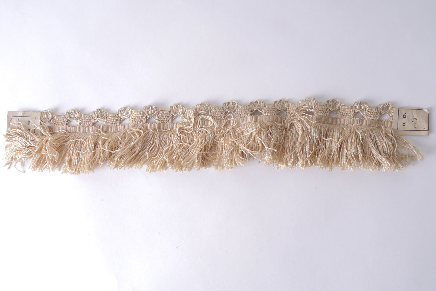 Effilé als onderdeel voor het vervaardigen van passement