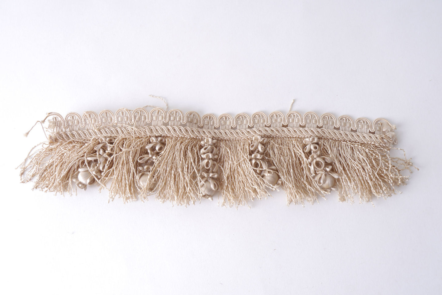 Effilé als onderdeel voor het vervaardigen van passement