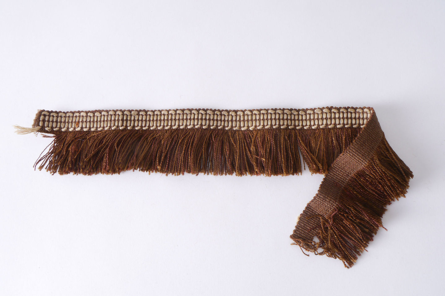 Effilé als onderdeel voor het vervaardigen van passement