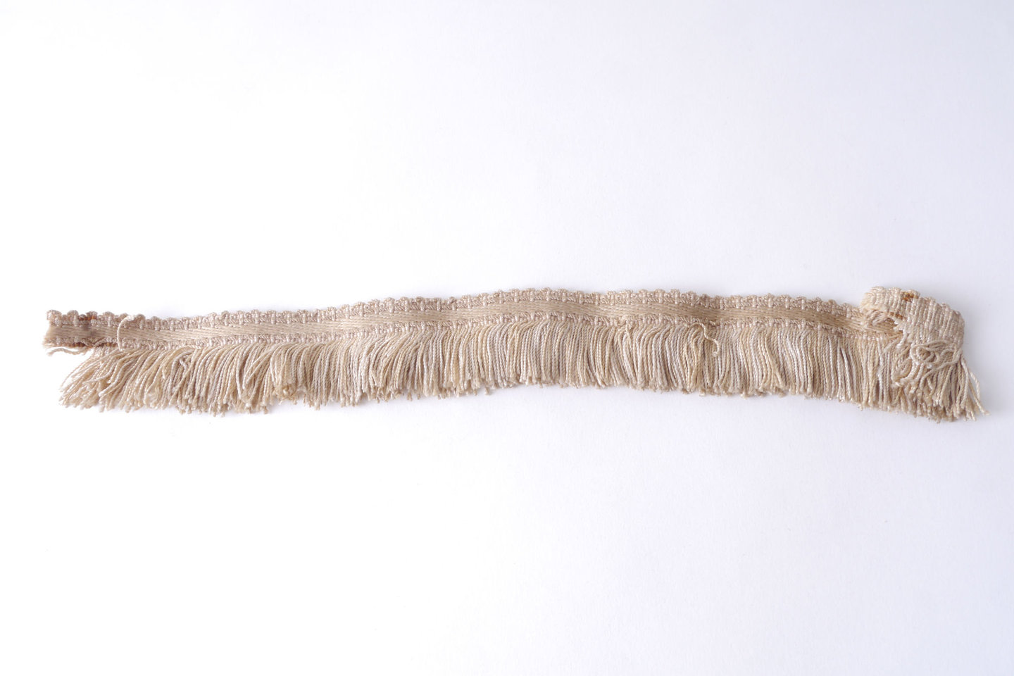 Effilé als onderdeel voor het vervaardigen van passement