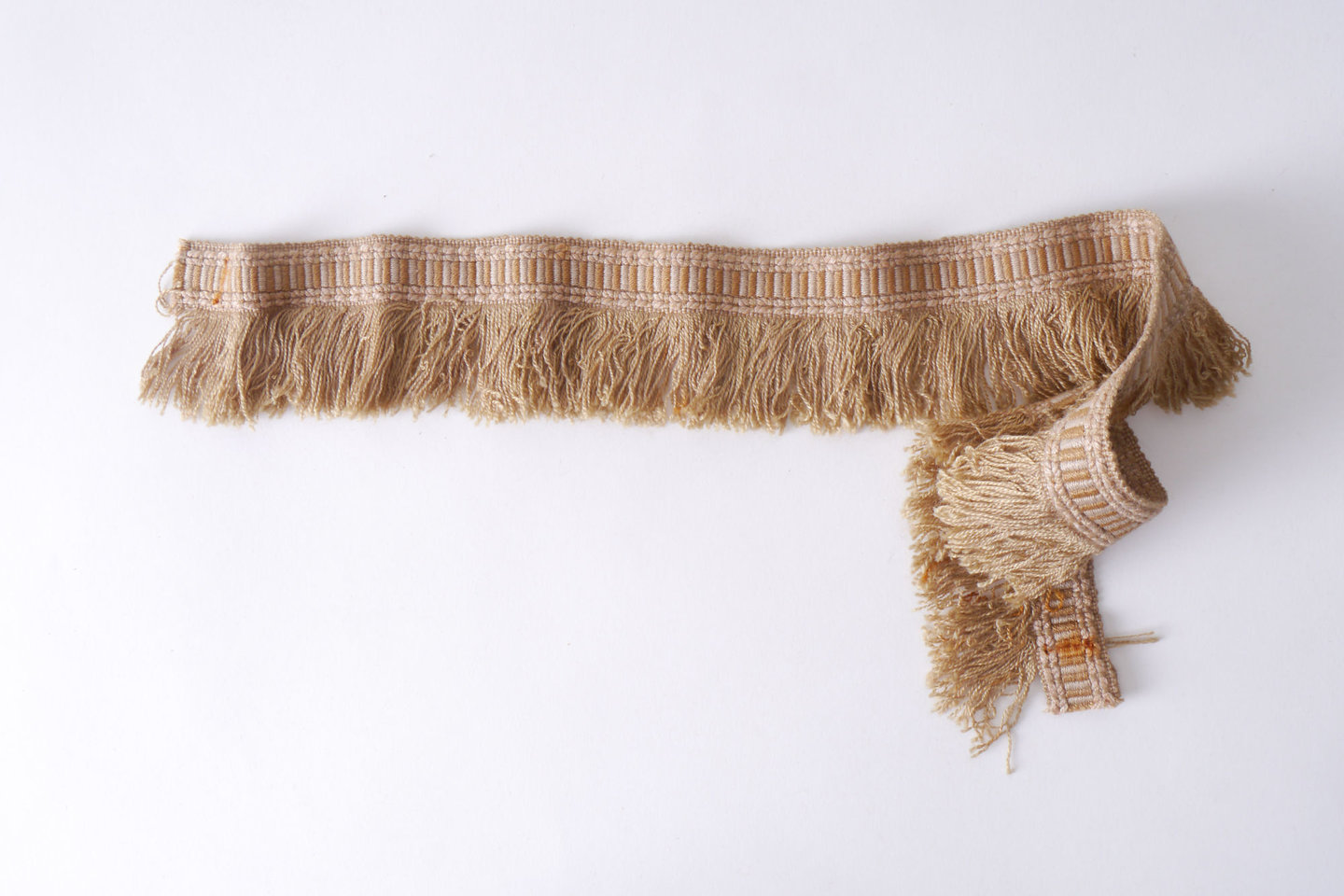 Effilé als onderdeel voor het vervaardigen van passement