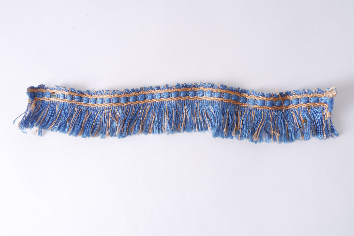 Effilé als onderdeel voor het vervaardigen van passement