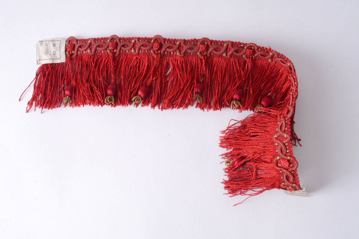 Effilé als onderdeel voor het vervaardigen van passement