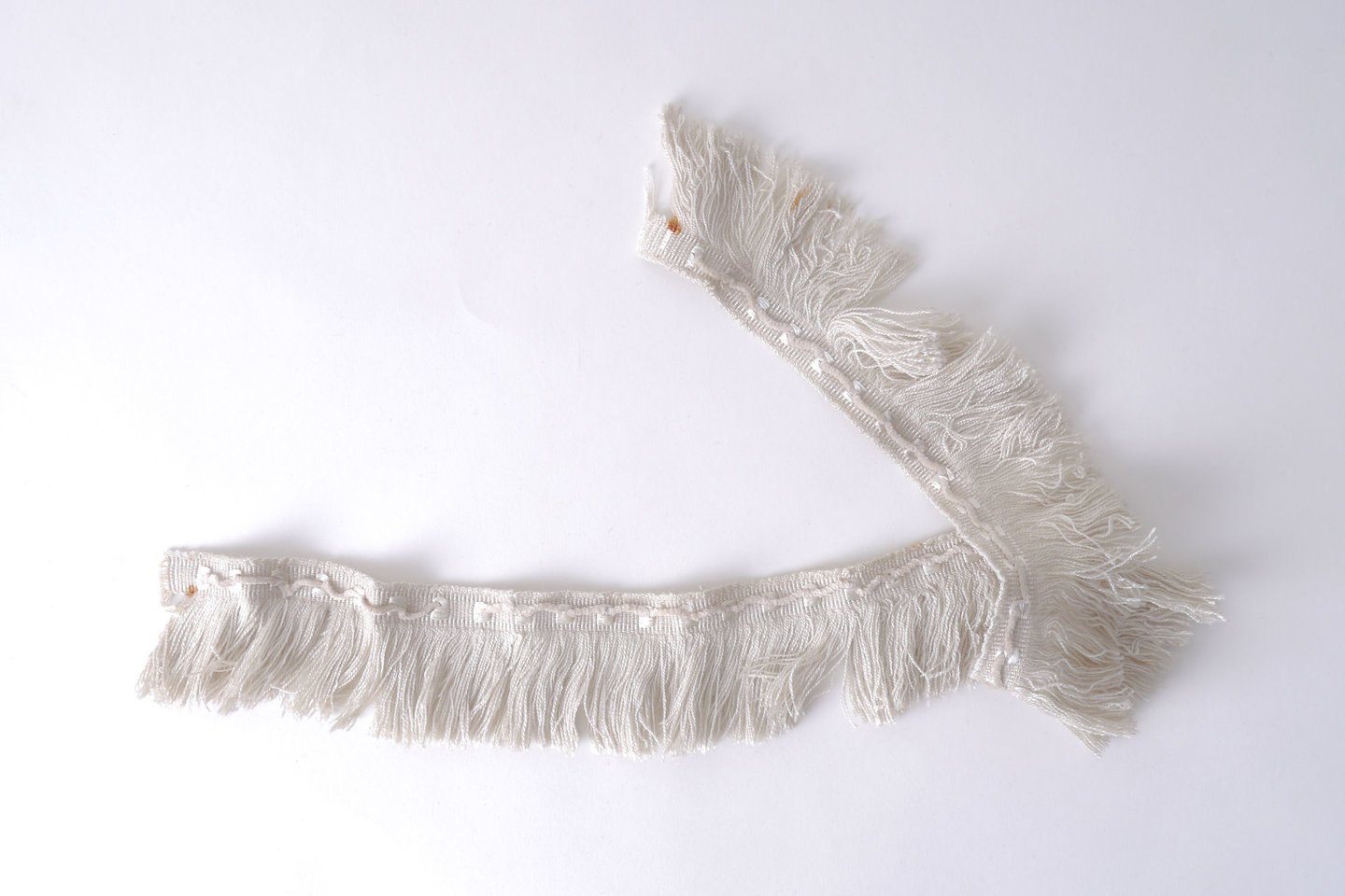 Effilé als onderdeel voor het vervaardigen van passement