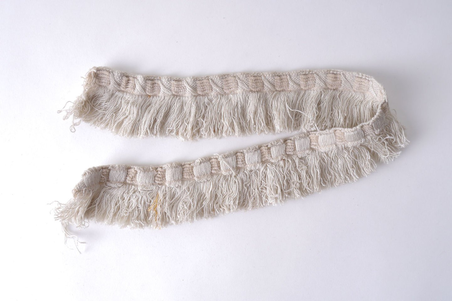 Effilé als onderdeel voor het vervaardigen van passement