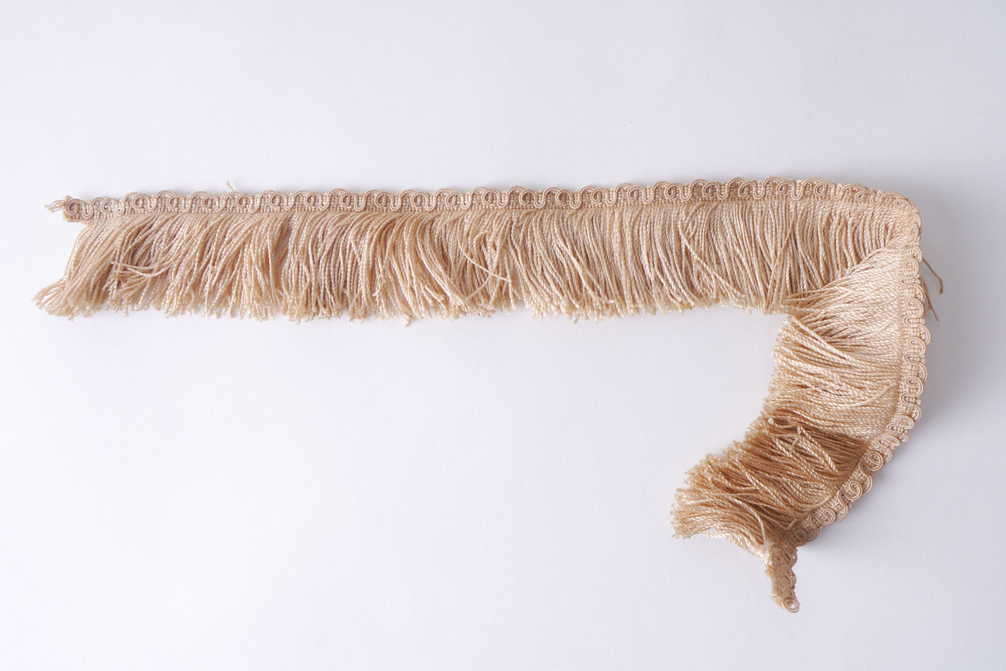 Effilé als onderdeel voor het vervaardigen van passement