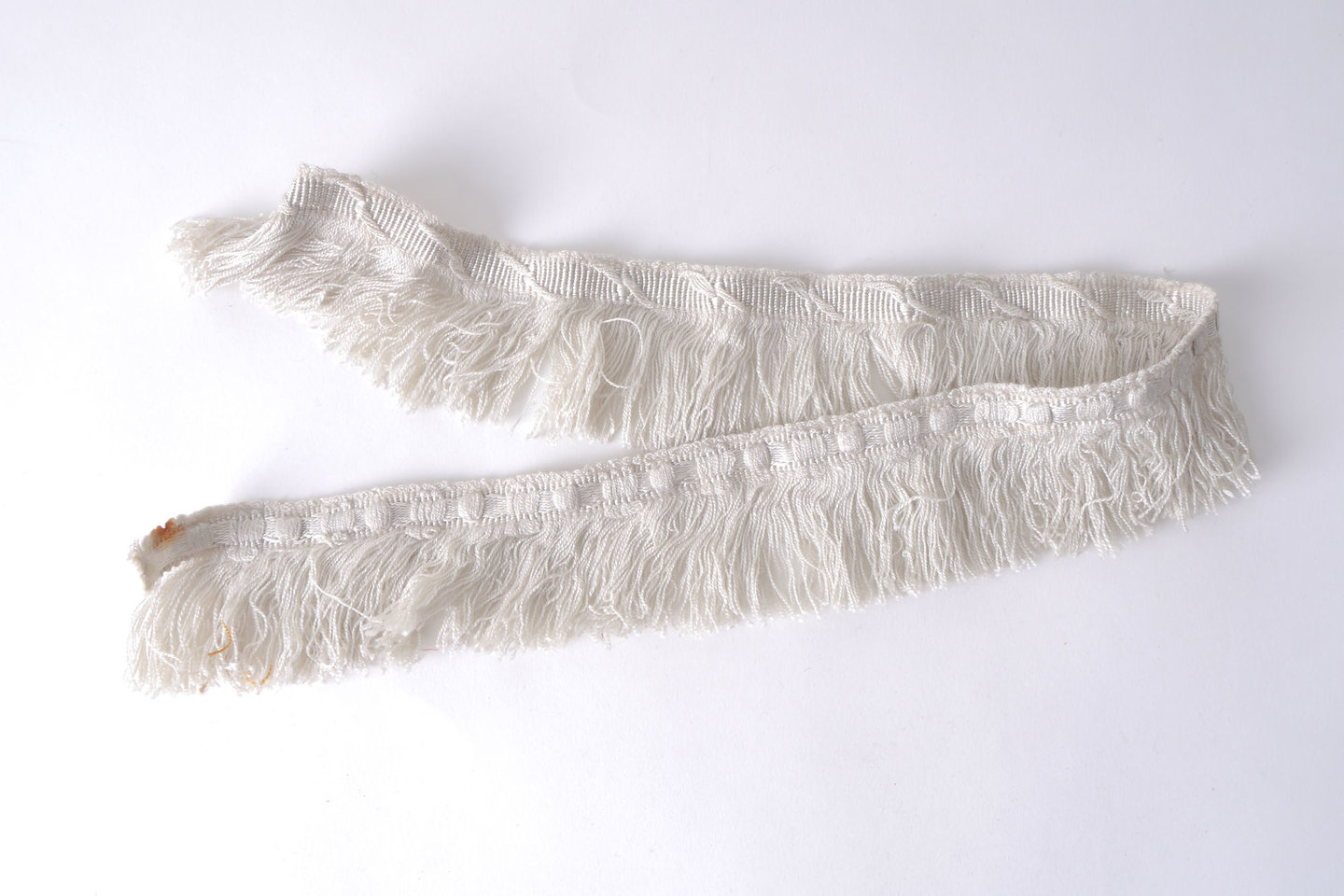 Effilé als onderdeel voor het vervaardigen van passement