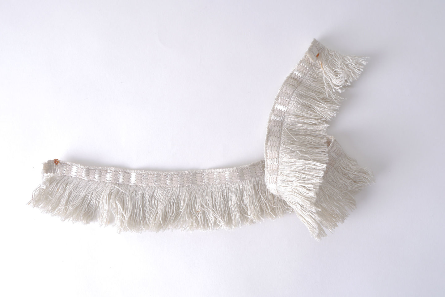 Effilé als onderdeel voor het vervaardigen van passement