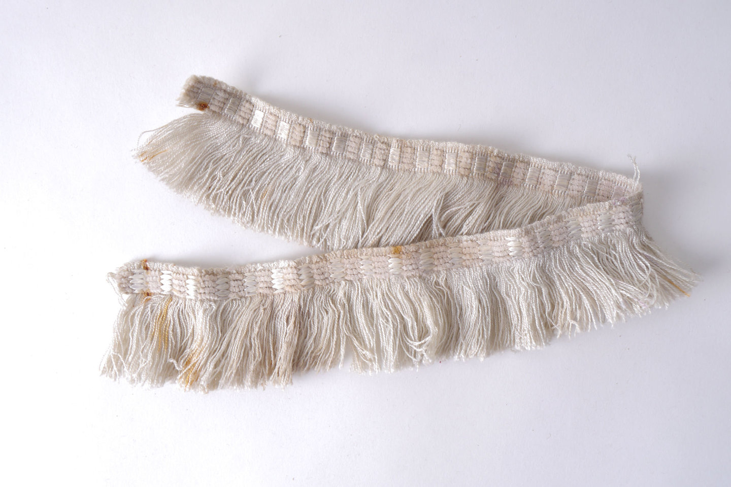 Effilé als onderdeel voor het vervaardigen van passement