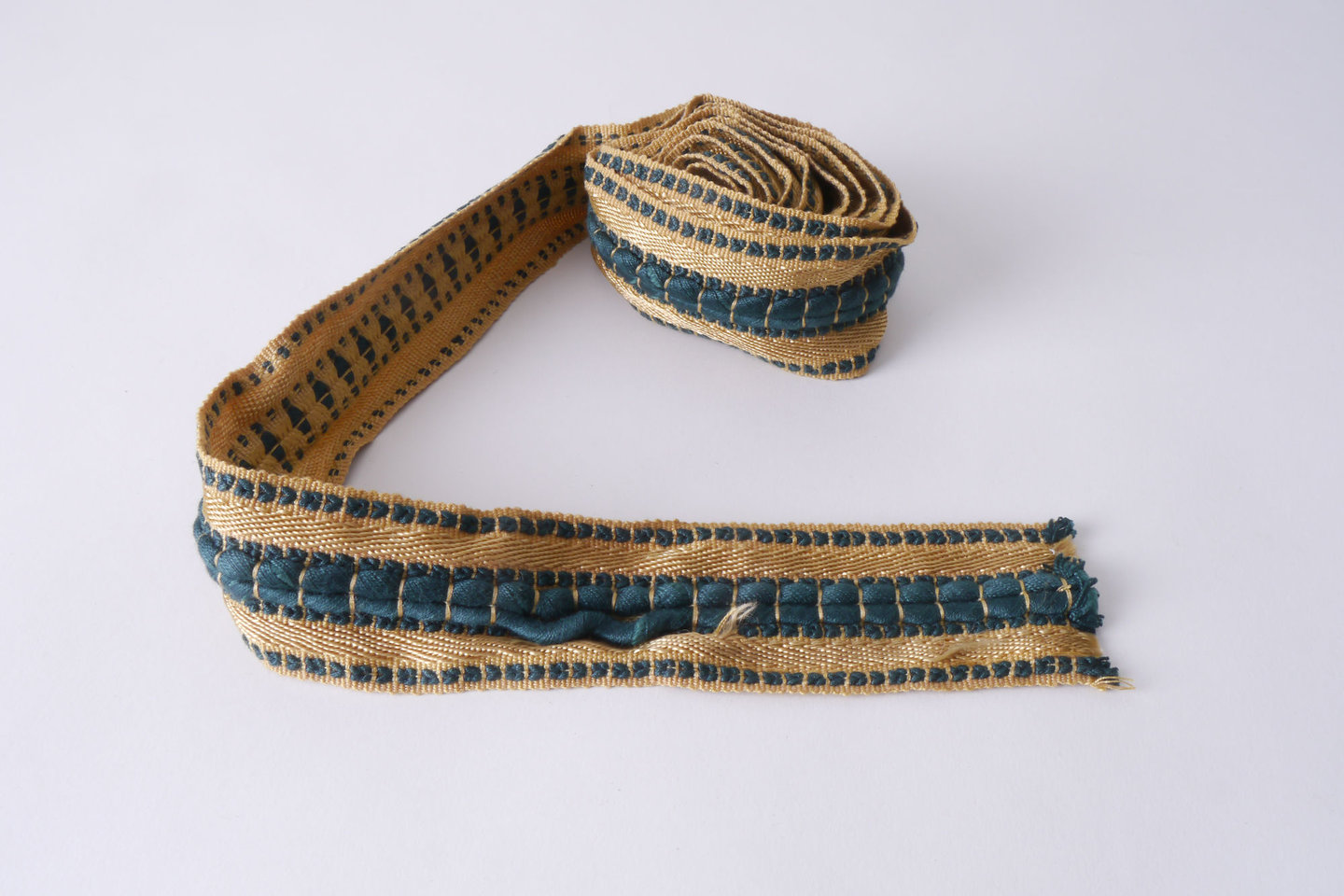 Galon of boord als onderdeel voor het vervaardigen van passement