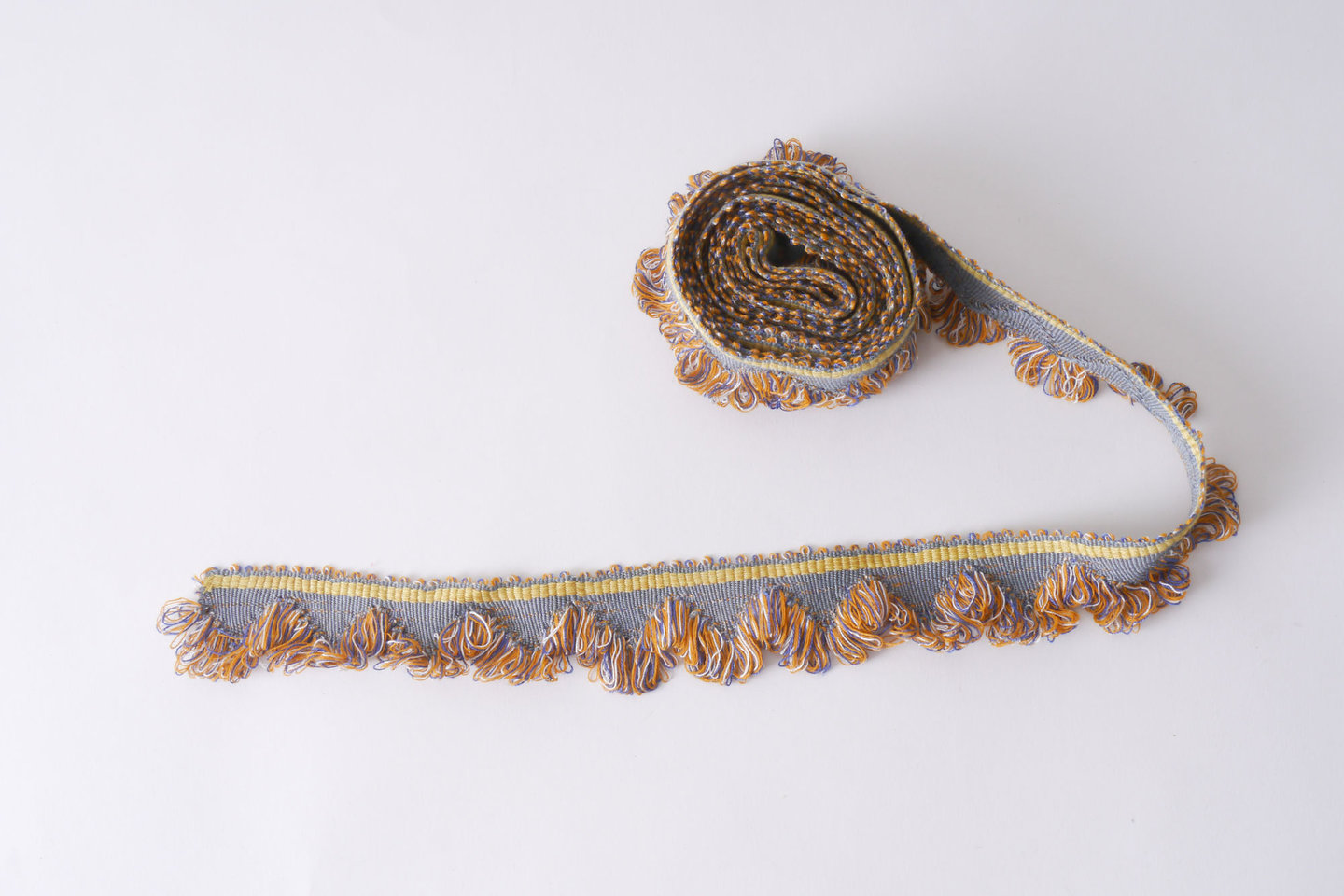 Effilé als onderdeel voor het vervaardigen van passement