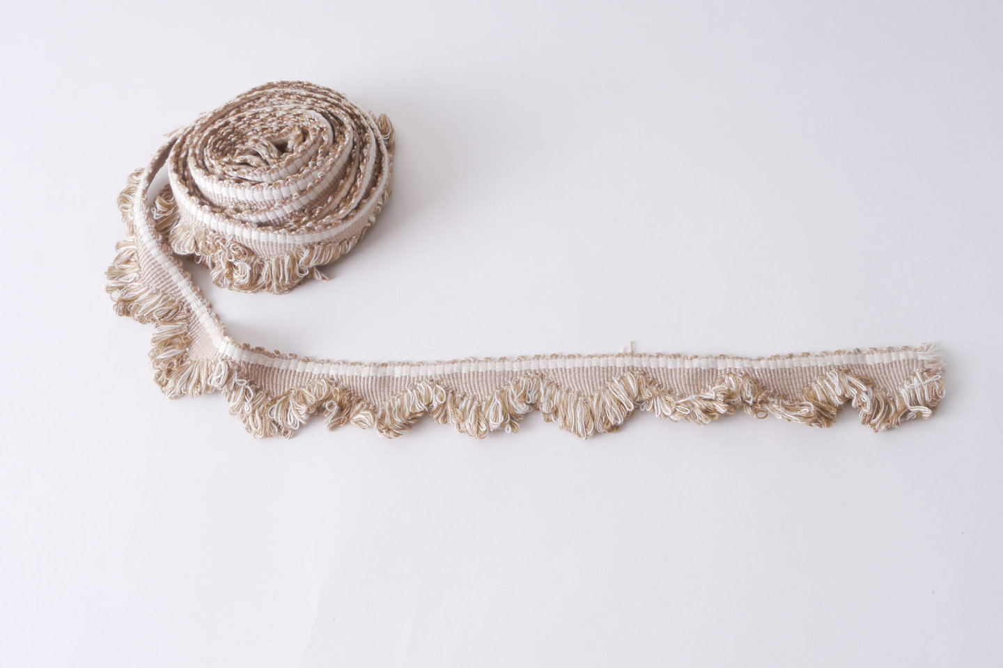 Effilé als onderdeel voor het vervaardigen van passement