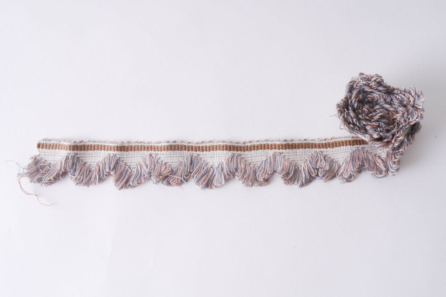 Effilé als onderdeel voor het vervaardigen van passement