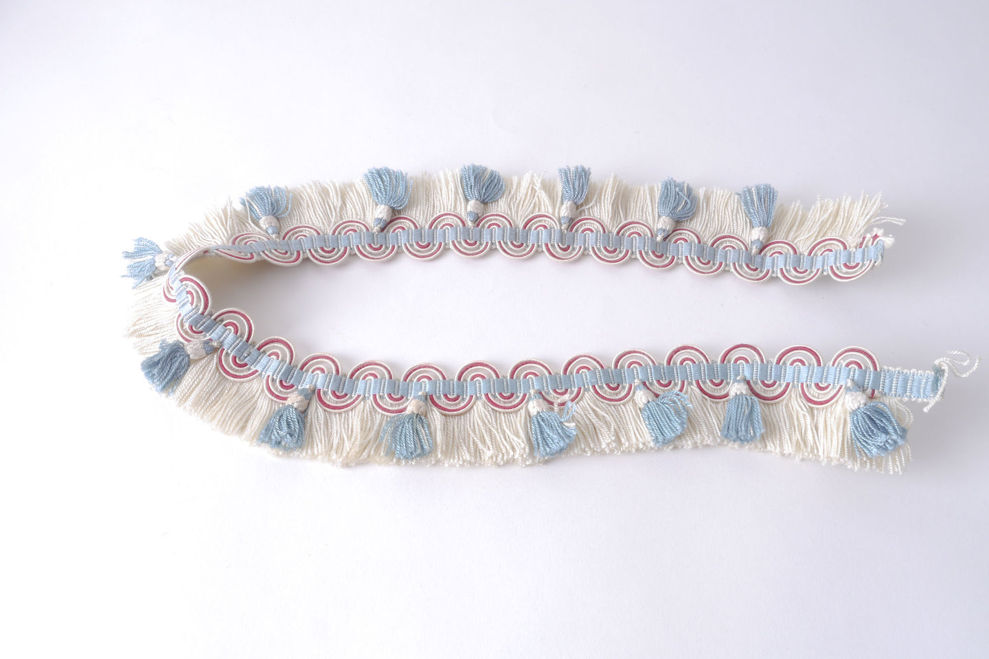 Effilé als onderdeel voor het vervaardigen van passement