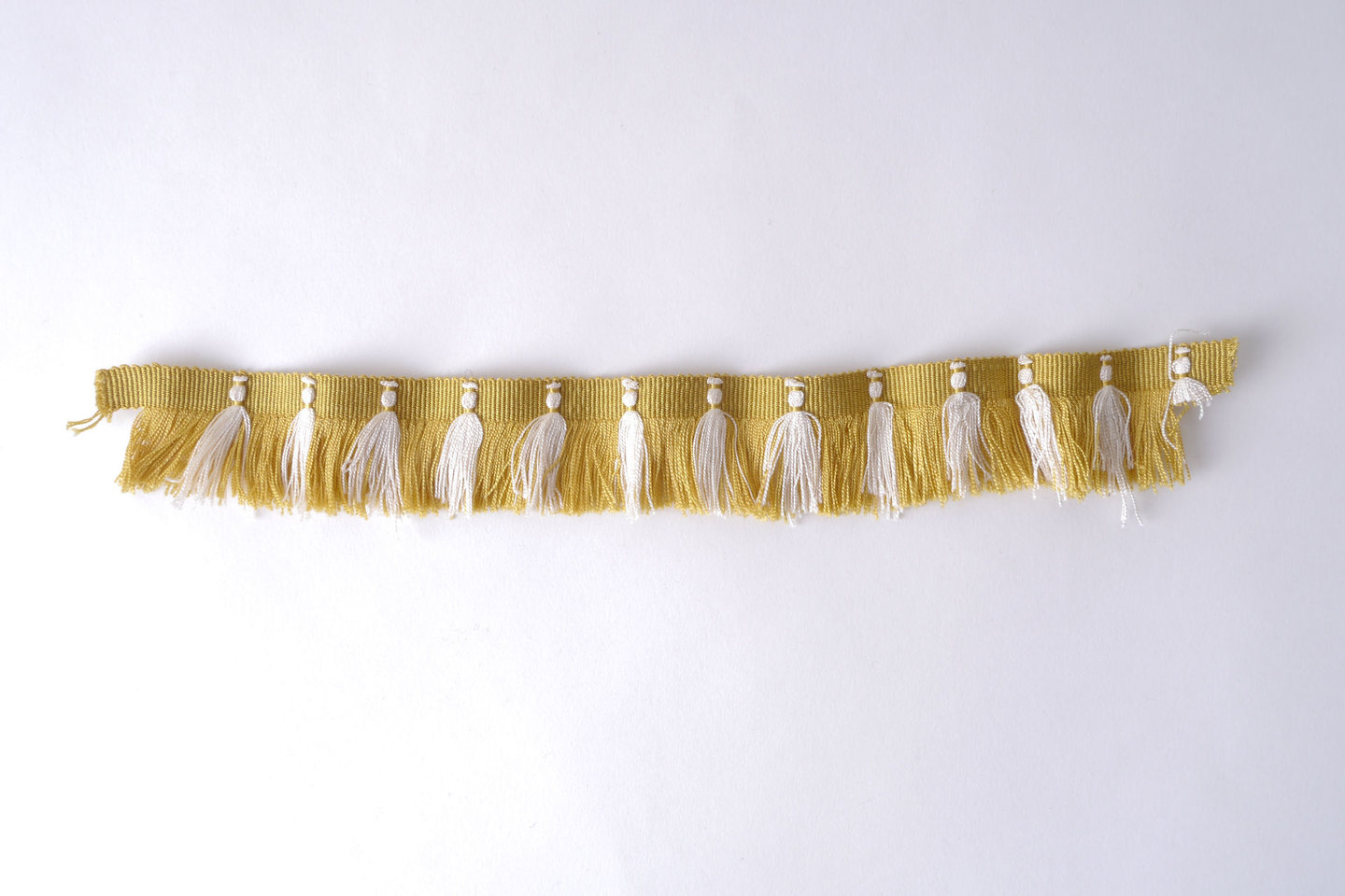 Effilé als onderdeel voor het vervaardigen van passement