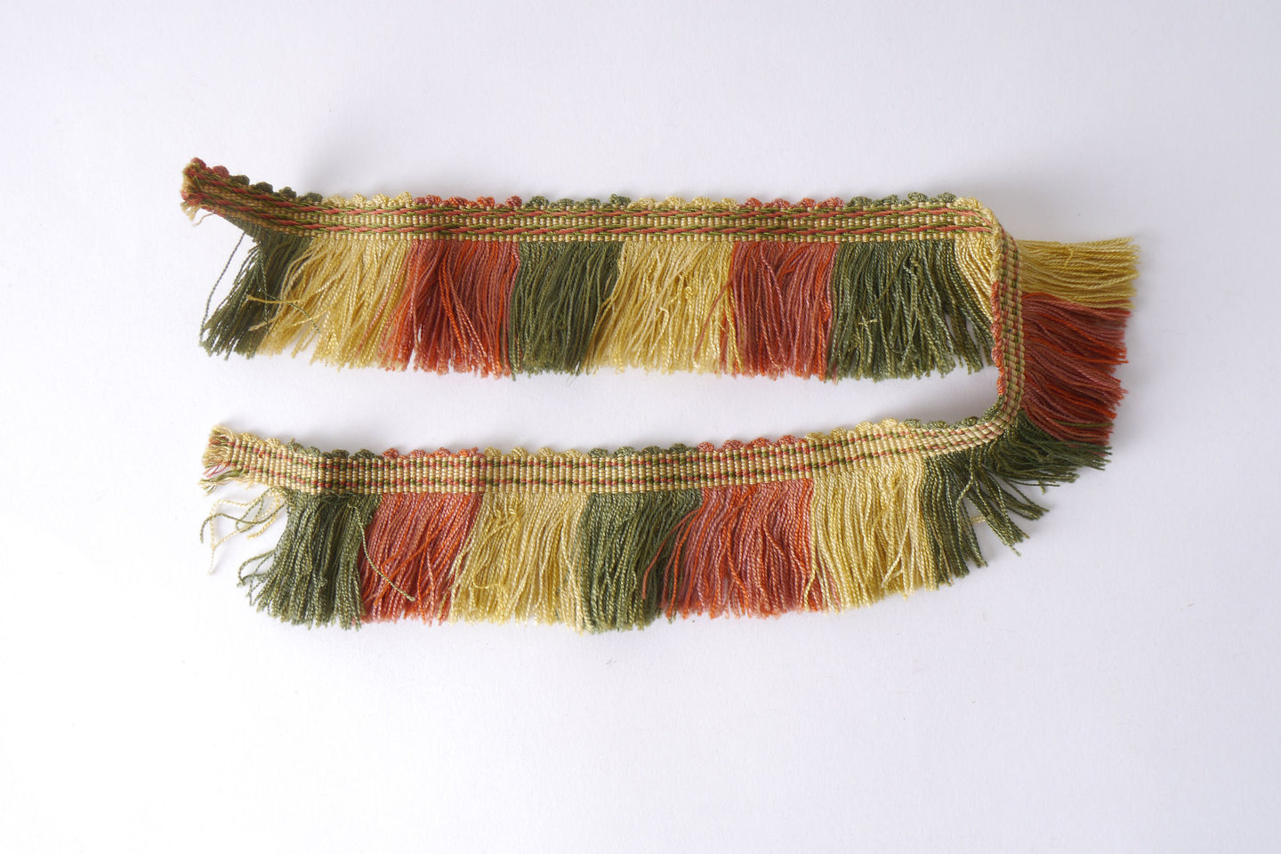 Effilé als onderdeel voor het vervaardigen van passement