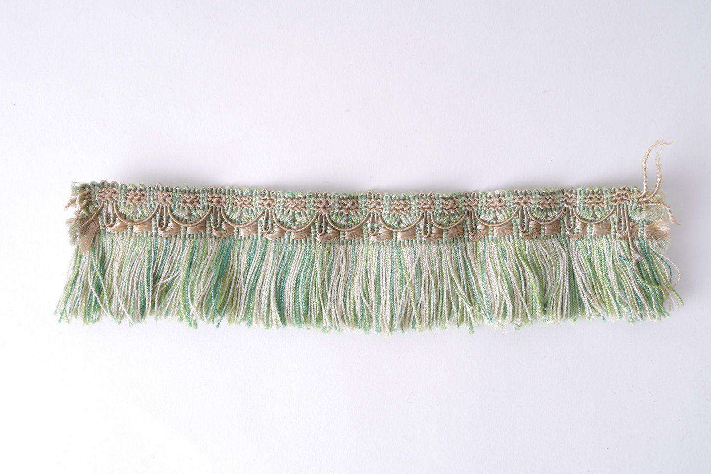 Effilé als onderdeel voor het vervaardigen van passement