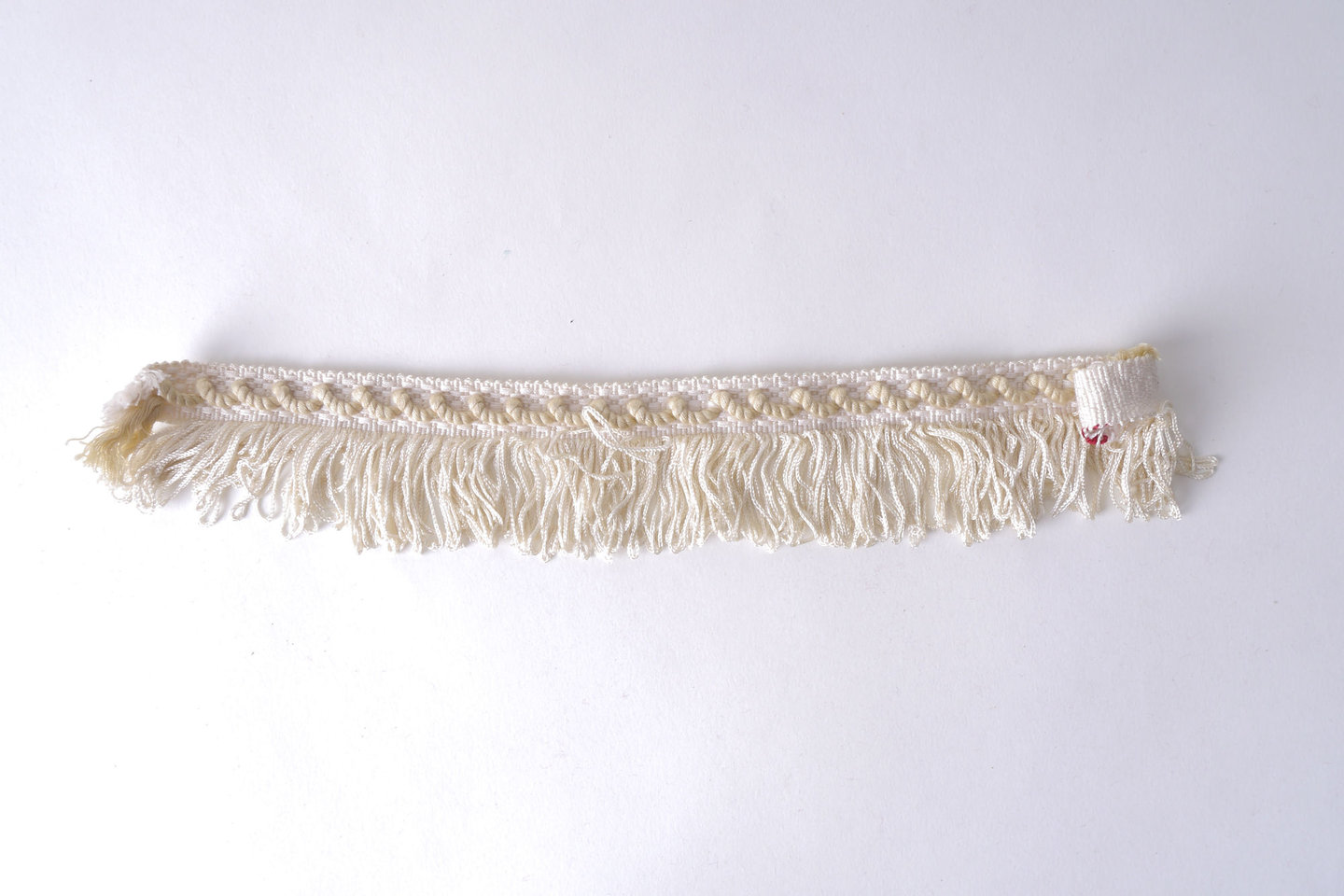 Effilé als onderdeel voor het vervaardigen van passement