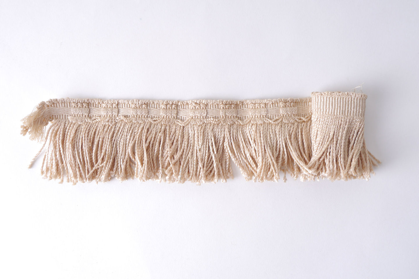 Effilé als onderdeel voor het vervaardigen van passement