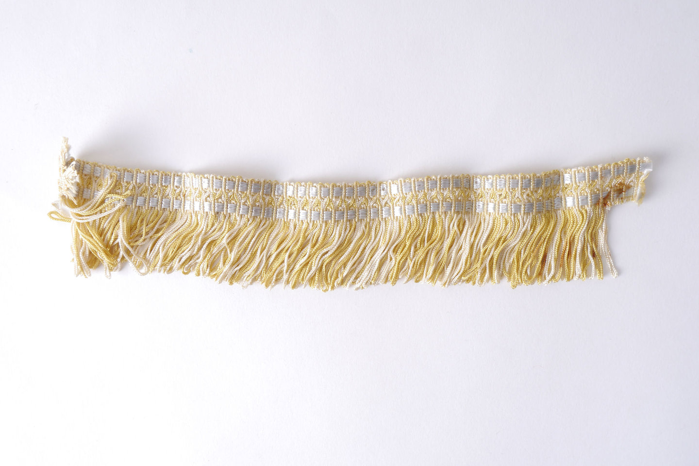 Effilé als onderdeel voor het vervaardigen van passement