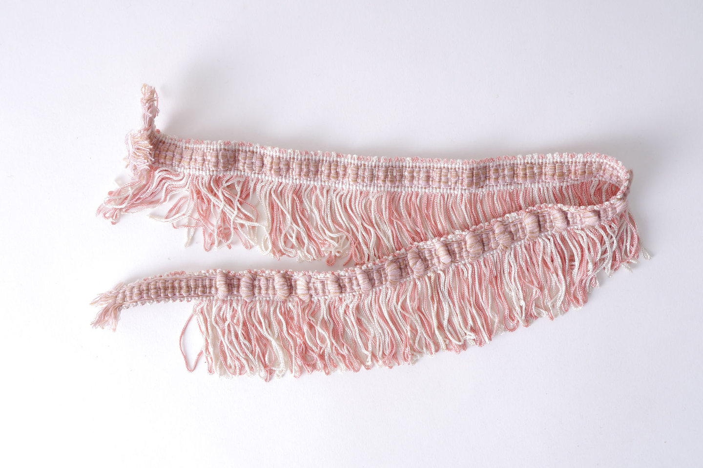 Effilé als onderdeel voor het vervaardigen van passement