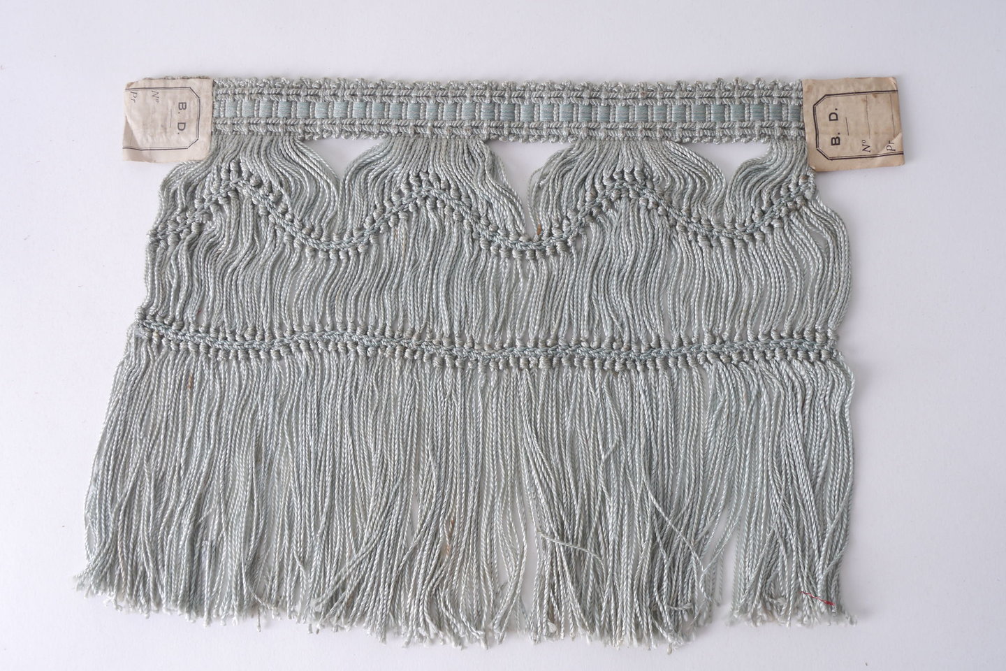 Frange als onderdeel voor het vervaardigen van passement