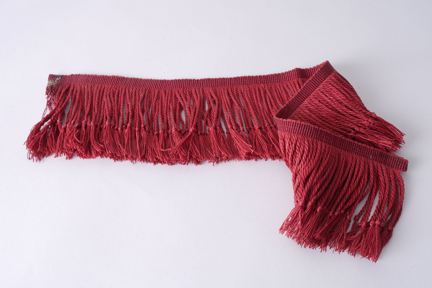 Frange als onderdeel voor het vervaardigen van passement