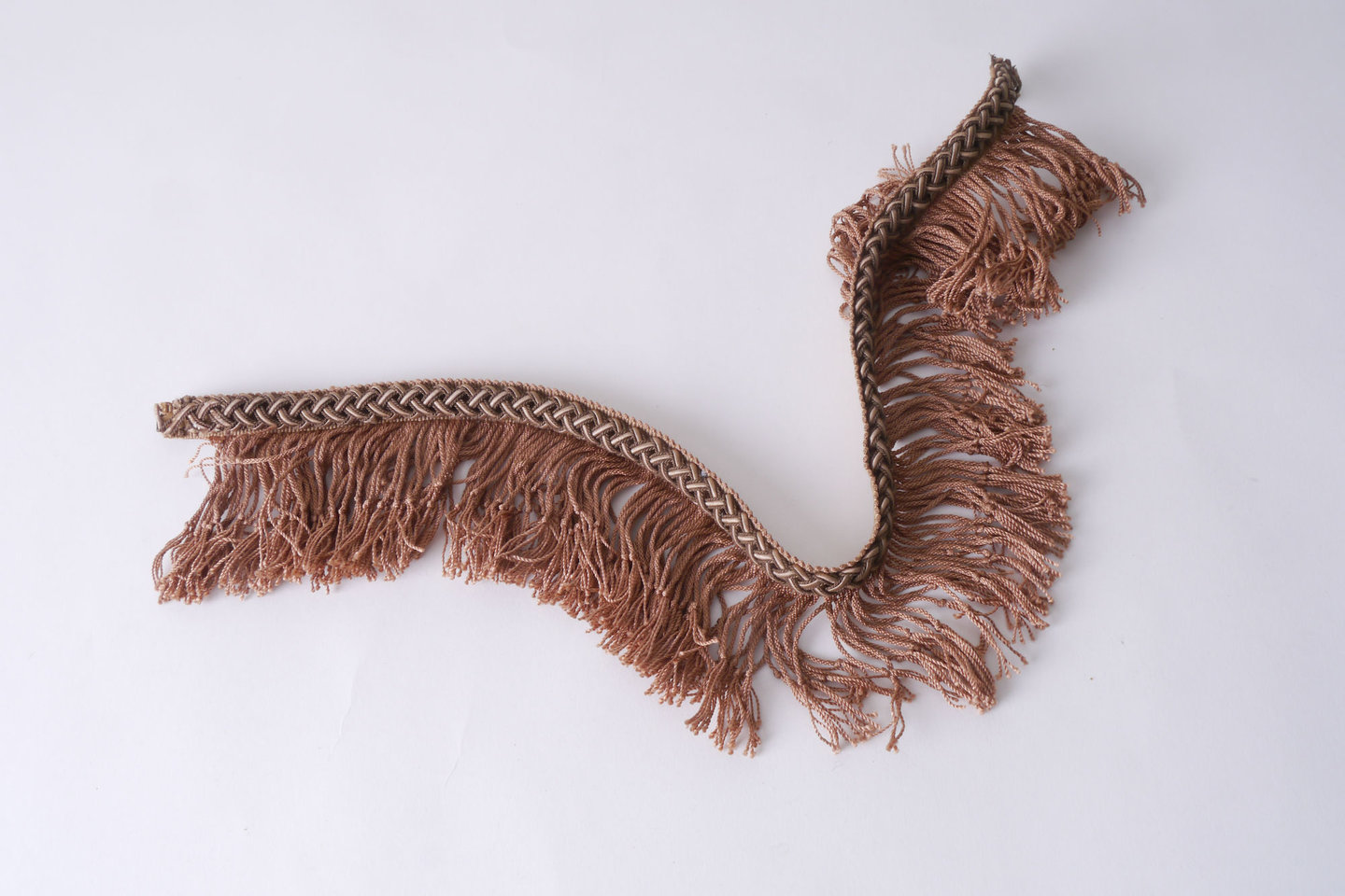 Effilé als onderdeel voor het vervaardigen van passement