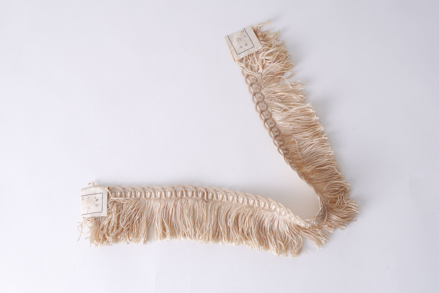 Effilé als onderdeel voor het vervaardigen van passement