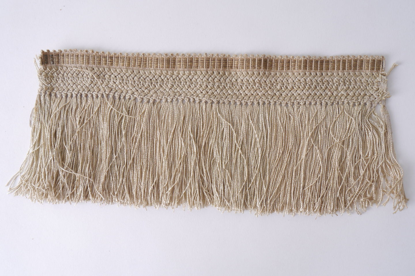 Frange als onderdeel voor het vervaardigen van passement