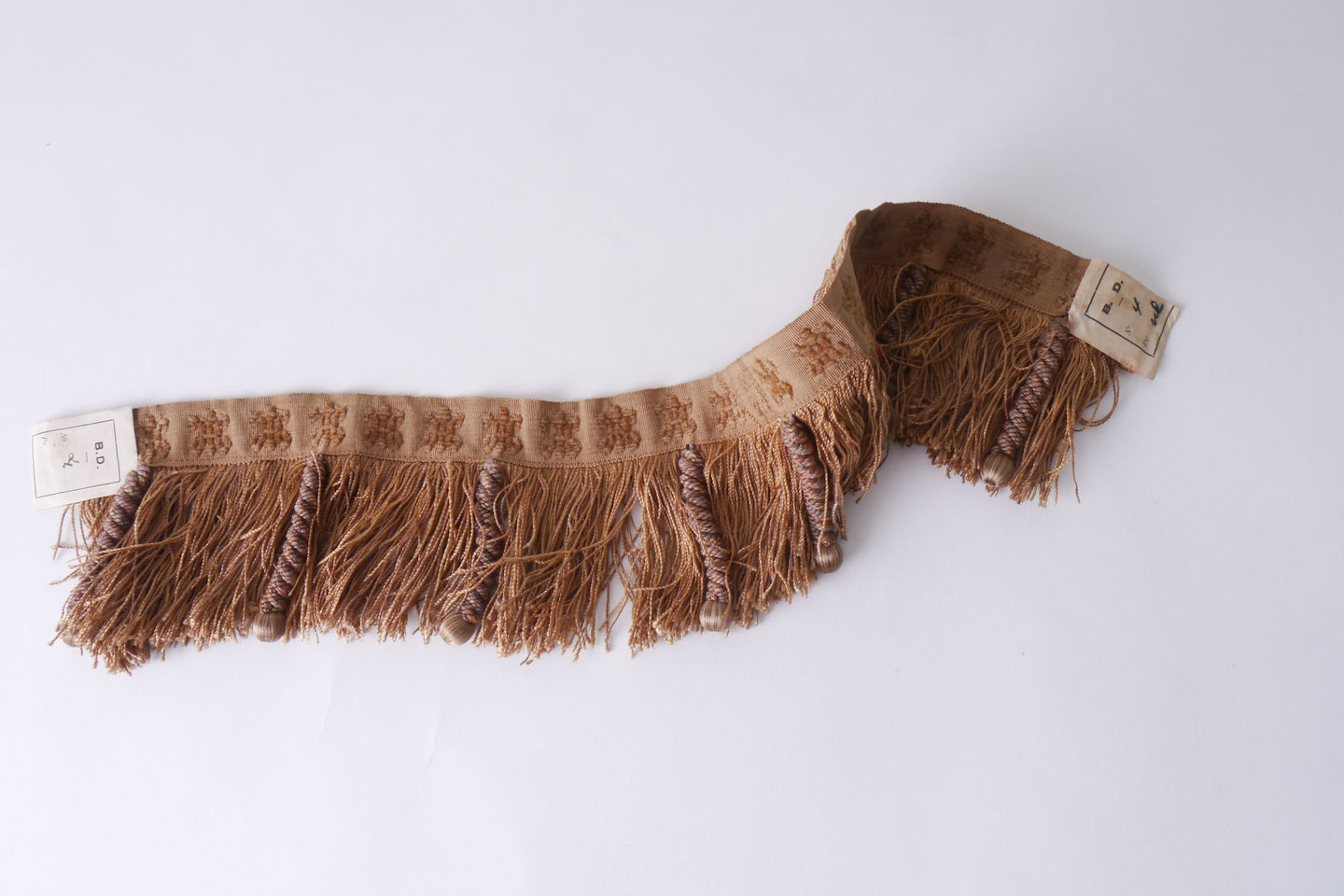 Effilé als onderdeel voor het vervaardigen van passement