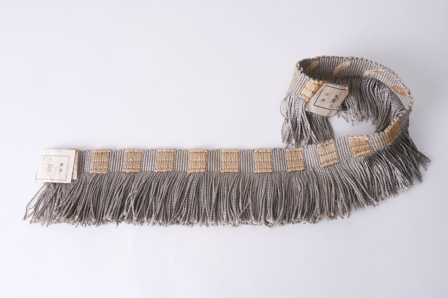 Effilé als onderdeel voor het vervaardigen van passement