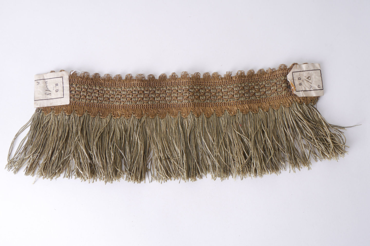 Effilé als onderdeel voor het vervaardigen van passement