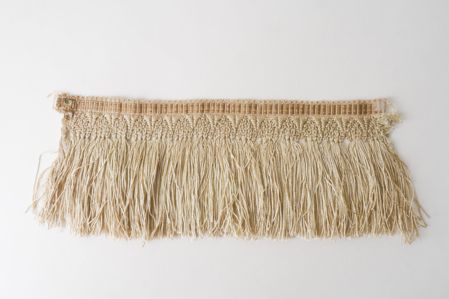 Frange als onderdeel voor het vervaardigen van passement