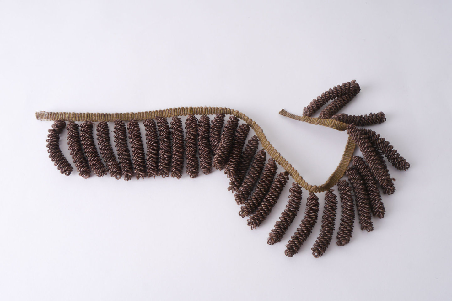 Frange als onderdeel voor het vervaardigen van passement