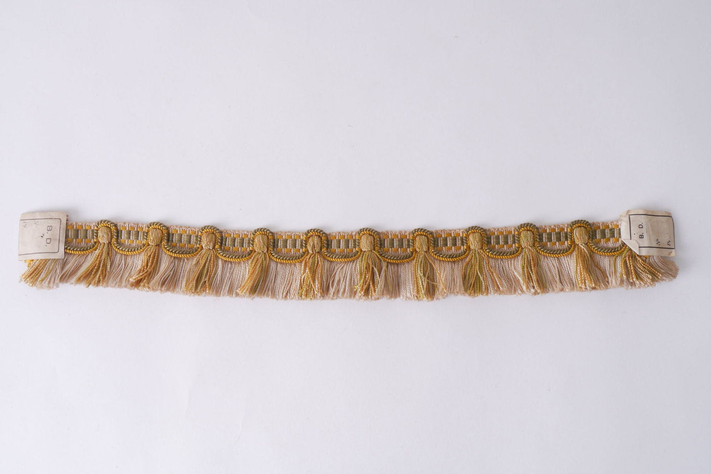 Effilé als onderdeel voor het vervaardigen van passement