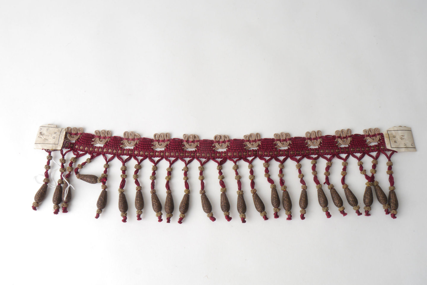 Frange als onderdeel voor het vervaardigen van passement