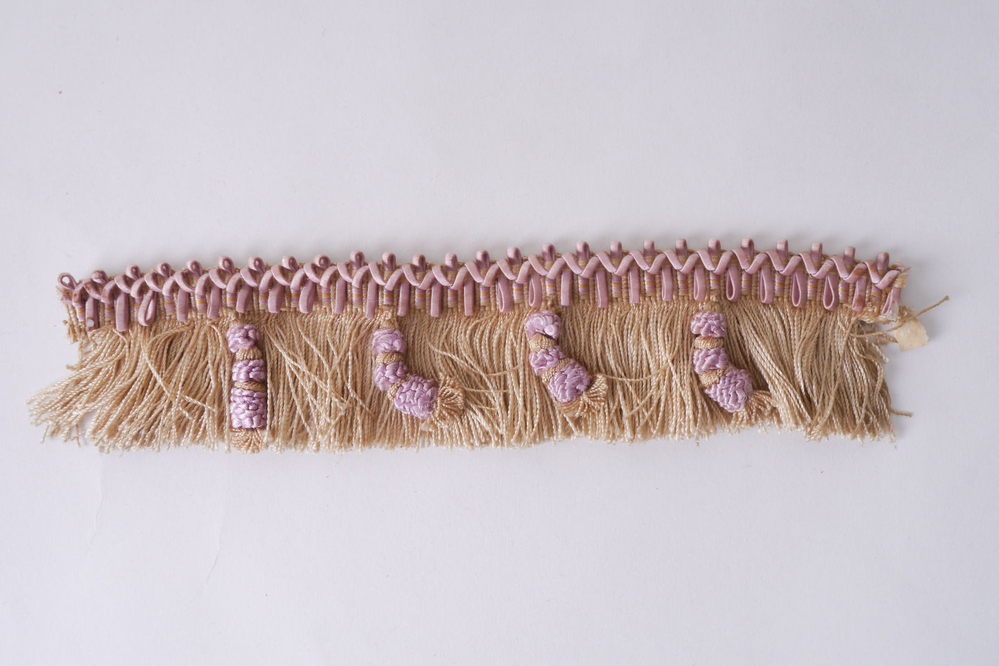 Effilé als onderdeel voor het vervaardigen van passement