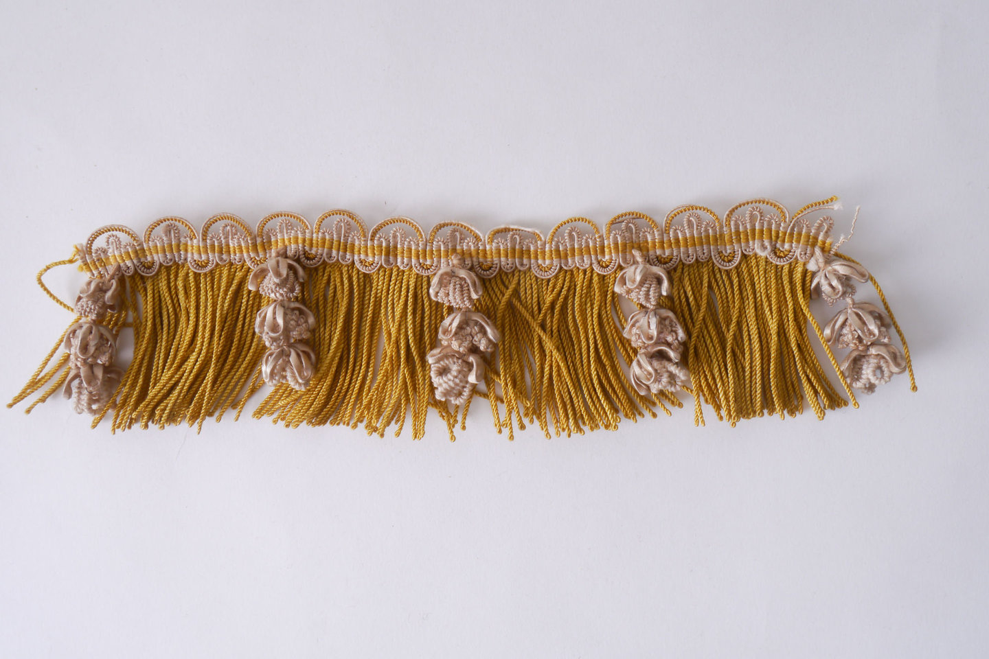 Effilé als onderdeel voor het vervaardigen van passement