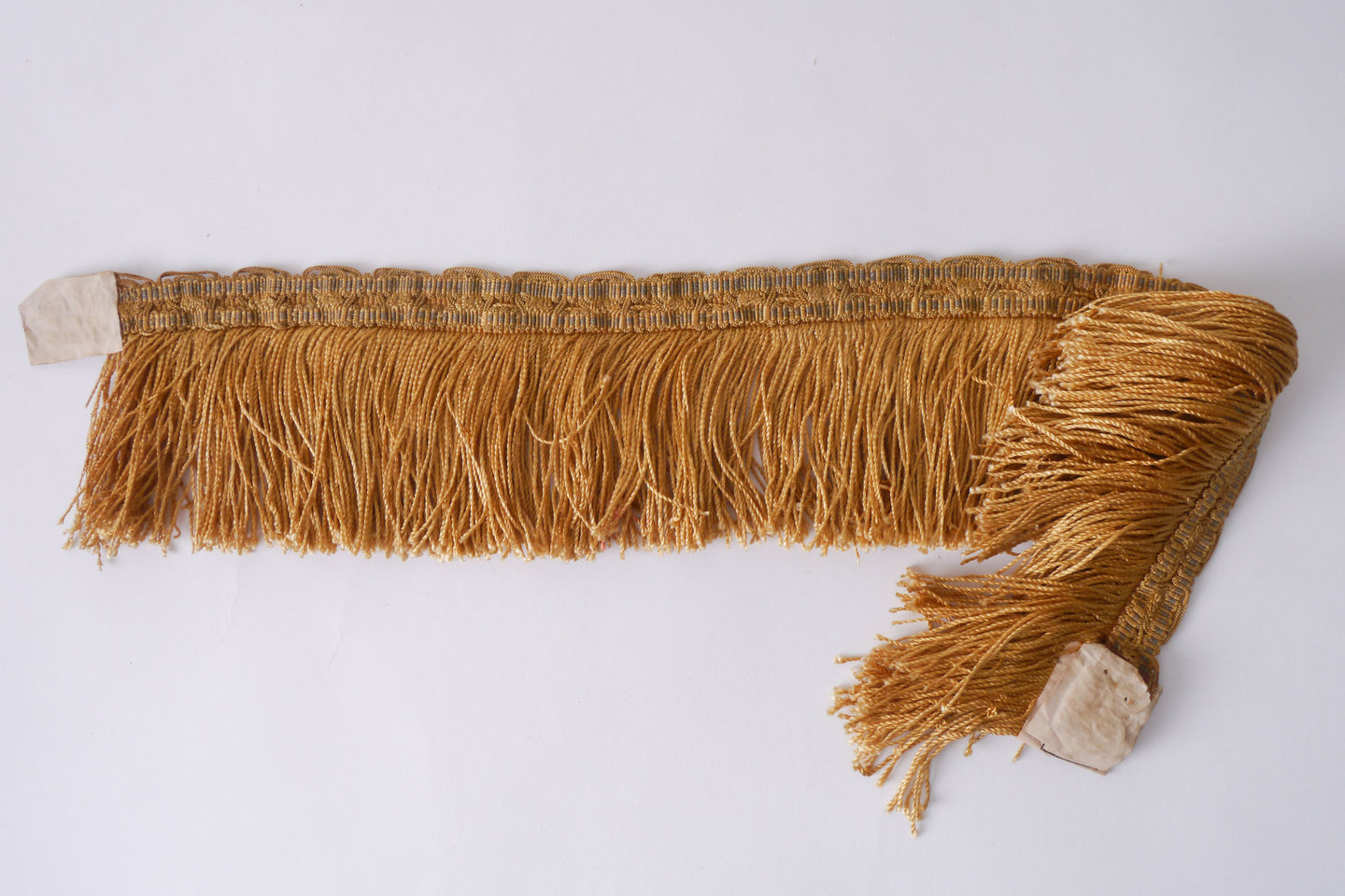 Effilé als onderdeel voor het vervaardigen van passement