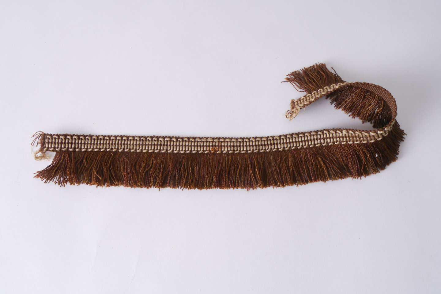 Effilé als onderdeel voor het vervaardigen van passement