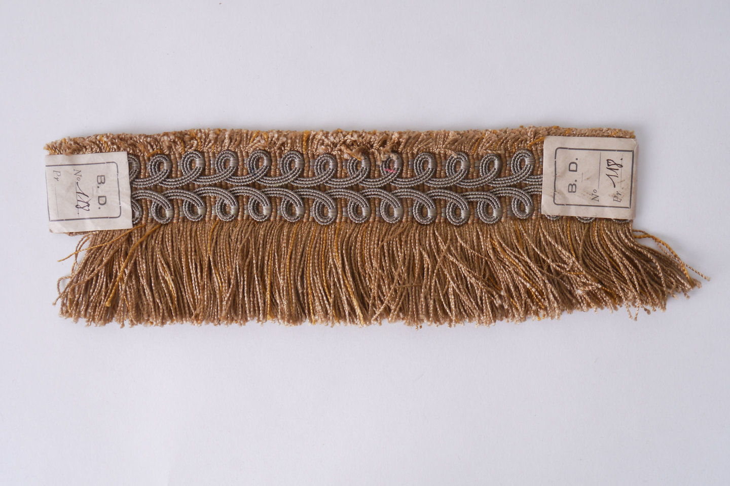 Effilé als onderdeel voor het vervaardigen van passement