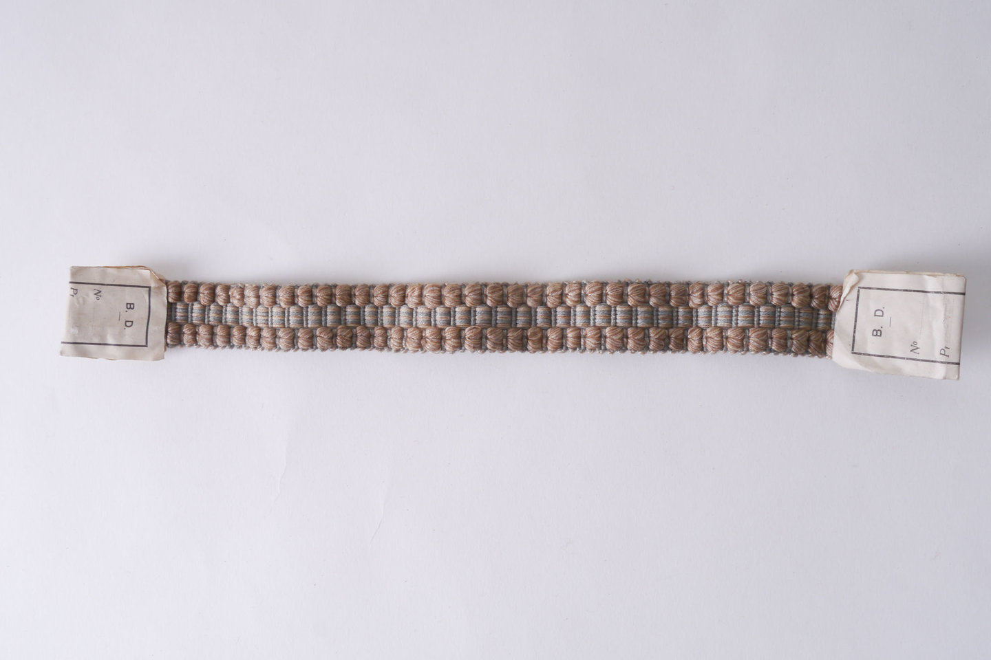 Galon of boord als onderdeel voor het vervaardigen van passement