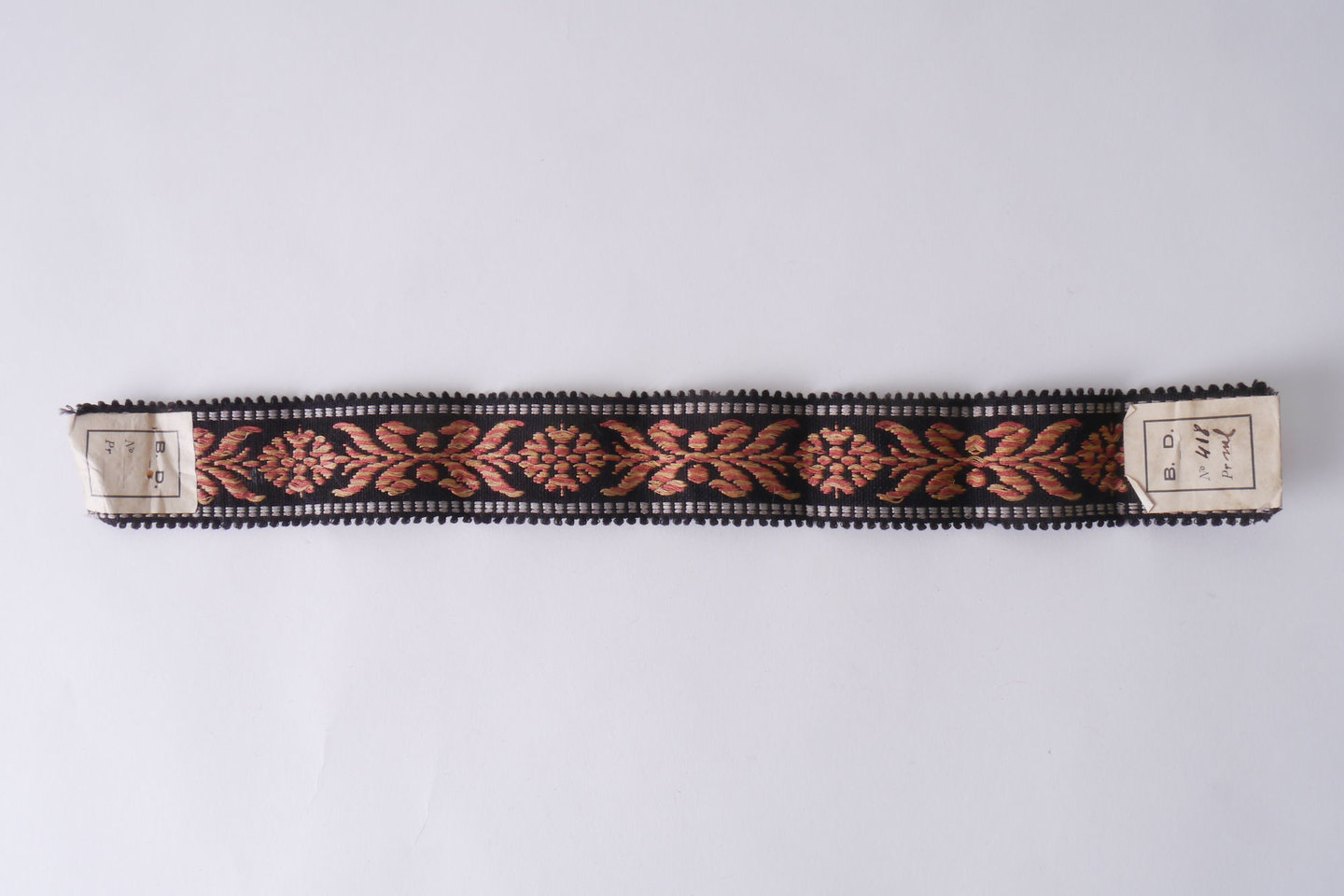 Galon of boord als onderdeel voor het vervaardigen van passement