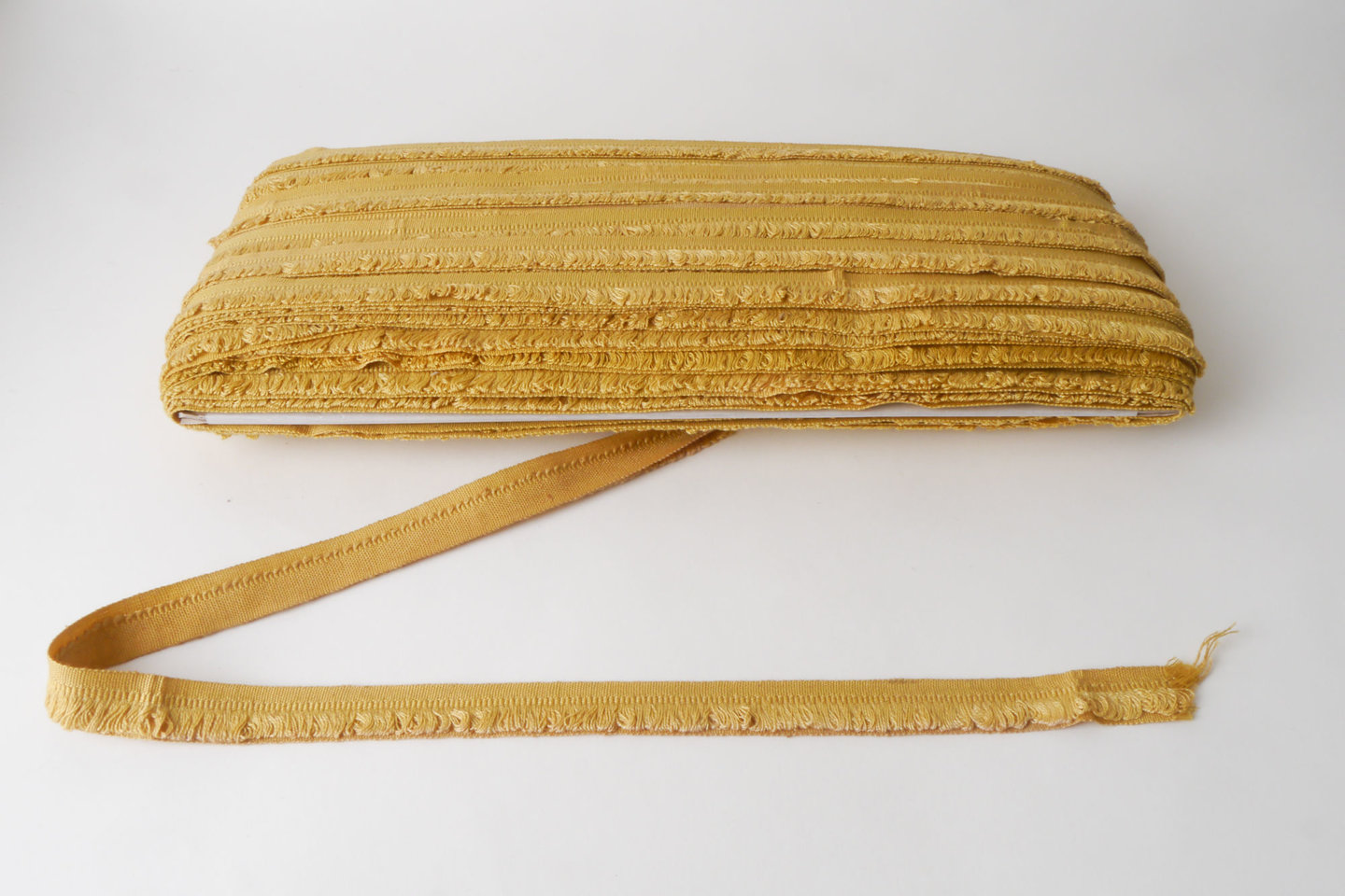 Galon of boord als onderdeel voor het vervaardigen van passement