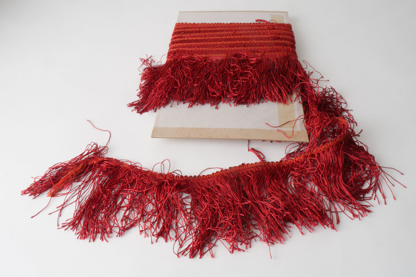 Effilé als onderdeel voor het vervaardigen van passement