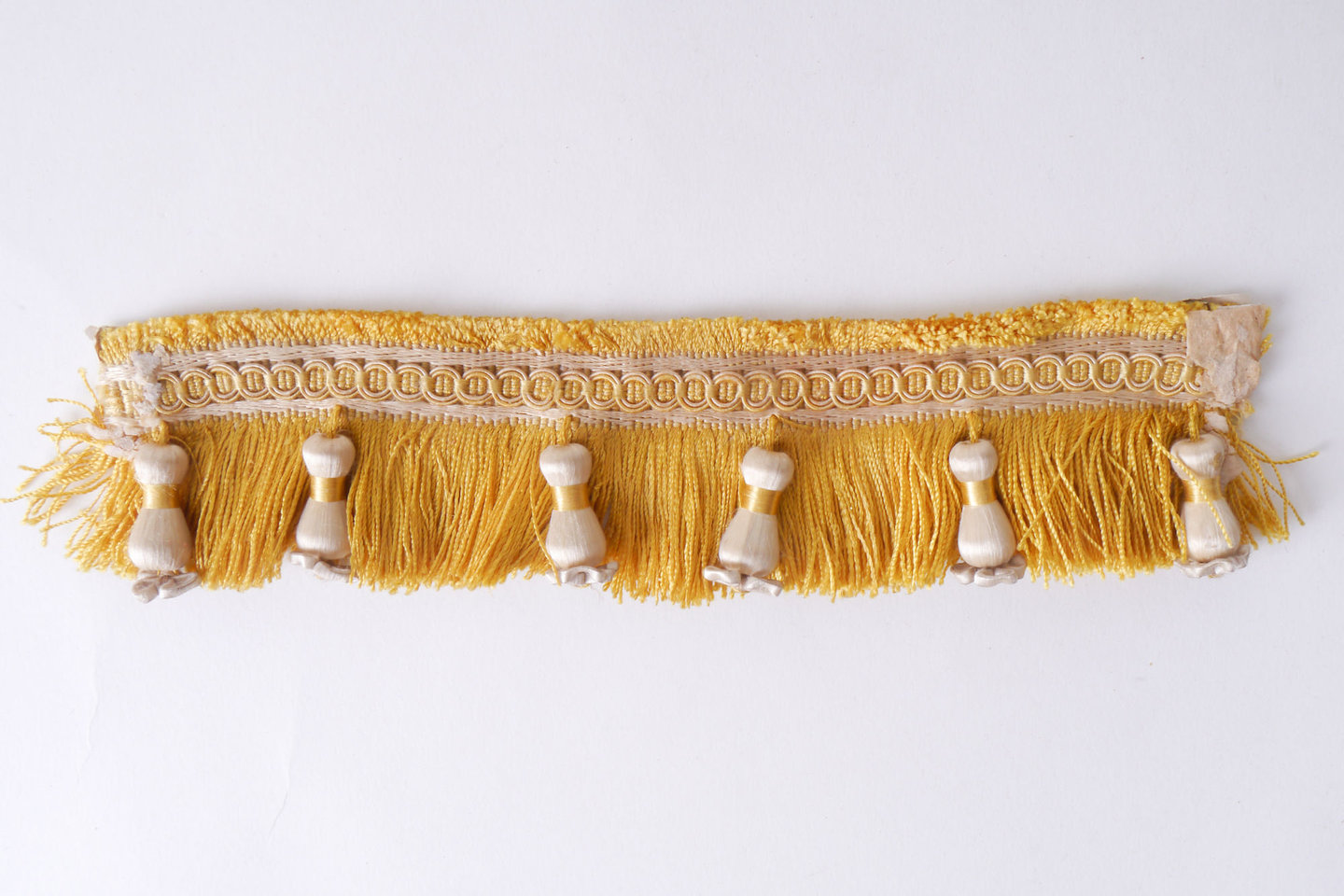 Effilé als onderdeel voor het vervaardigen van passement