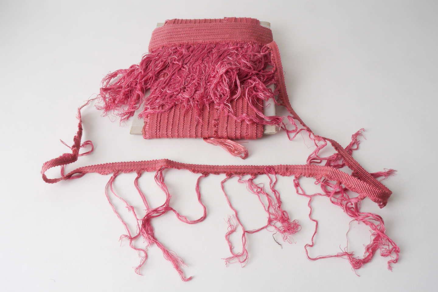 Frange als onderdeel voor het vervaardigen van passement