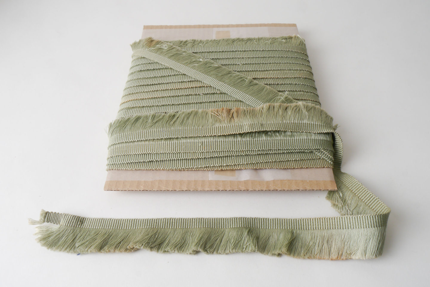 Effilé als onderdeel voor het vervaardigen van passement