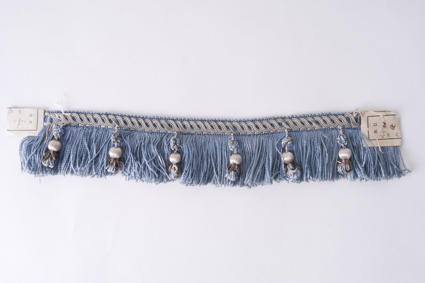 Effilé als onderdeel voor het vervaardigen van passement